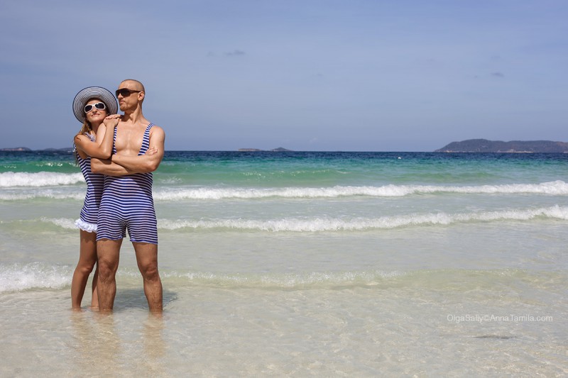 Beautiful couple in retro swimsuit on the beach